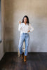 Every Girl's Go-To White Button Down